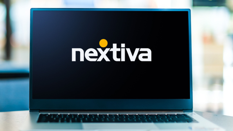 Laptop computer displaying logo of Nextiva, a voice-over-internet-protocol (VoIP) company based in Scottsdale, Arizona