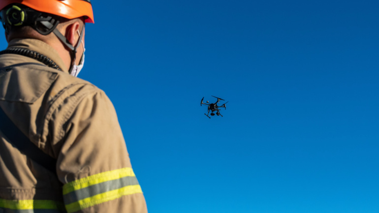 firefighter flying rescue big drone. Nokia.