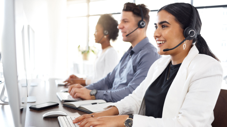 Woman, call center and computer typing and consulting in telemarketing, customer service or support at office