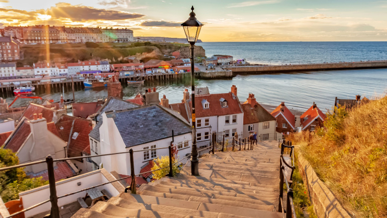 Whitby, North Yorkshire Coast, England 24th August 2018: Famous 199 steps at sunset over the harbour at Whitby, Gigaclear