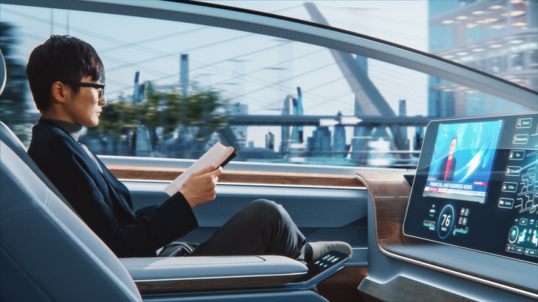 Futuristic Concept: Handsome Stylish Japanese Businessman in Glasses Reading Notebook and Watching News on Augmented Reality Screen while Sitting in a Autonomous Self-Driving Zero-Emission, Samsung Wind River