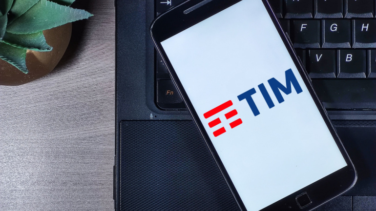 TIM Enterprise logo on the smartphone screen. TIM (acronym for Telecom Italia Mobile) is a cell phone company based in Italy, also active in Brazil.
