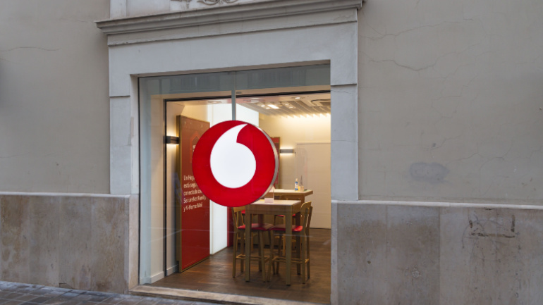 VALENCIA, SPAIN - SEPTEMBER 30, 2021: Vodafone is a British multinational telecommunications company. Vodafone will close all its Spanish shops by March 2022, Vodafone Sale