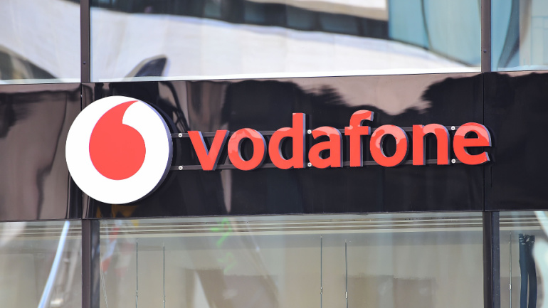telecommunications company Vodafone store exterior. Vodafone Group plc is a cmultinational telecommunications company and based in London, England. Vodafone 5G Ultra