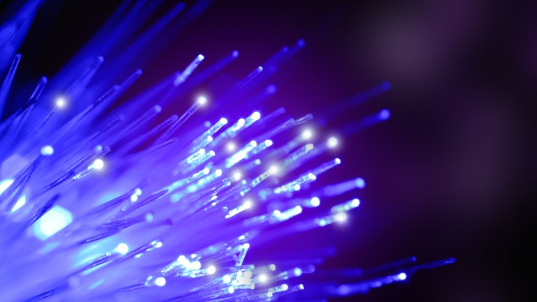 PCCW has finalized an agreement to sell a 40% stake in its fibre business to China Merchants Group, a state-owned investor, for $870 million.